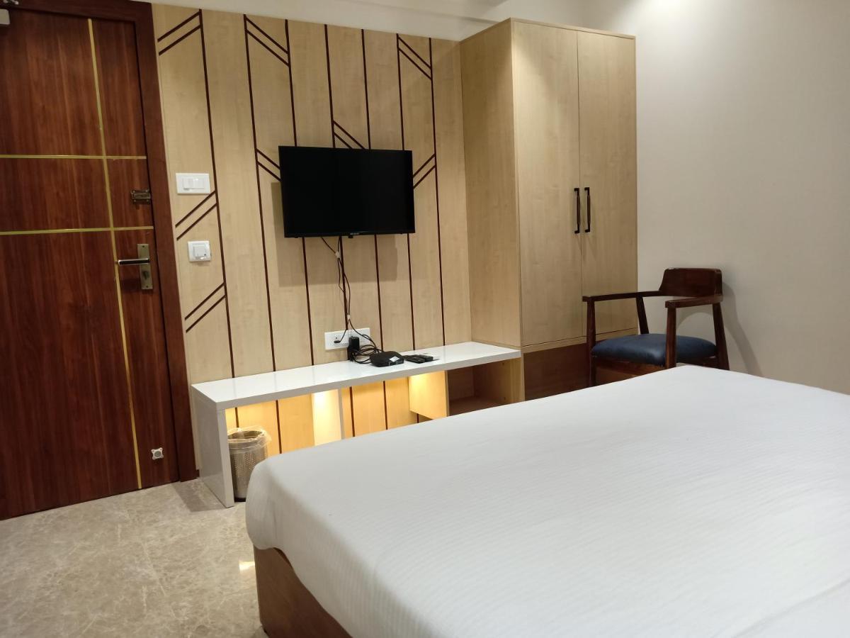 Hotel Suvarnam Residency Ahmednagar Pokoj fotografie